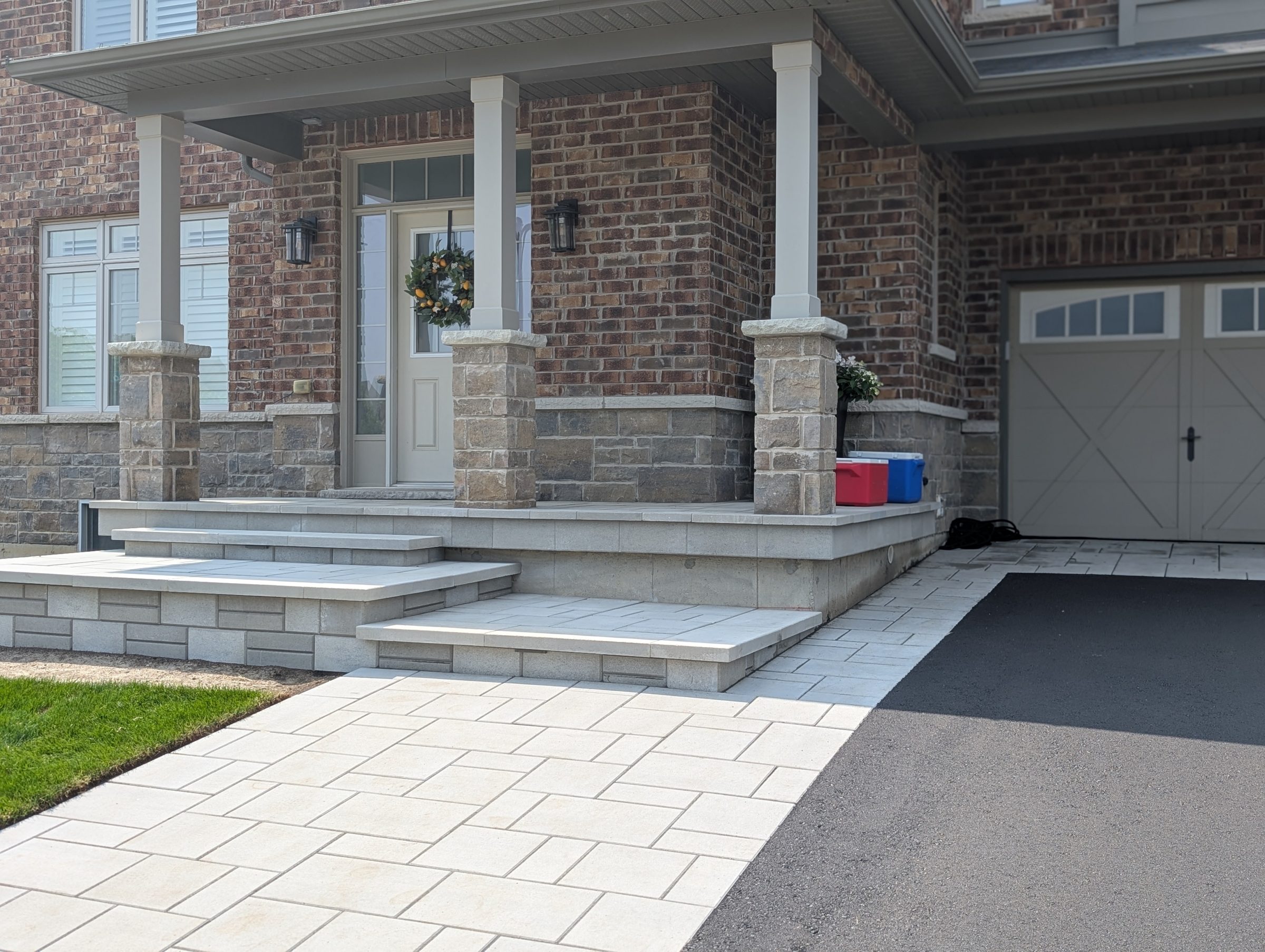Natural stone front entrance steps and walkway — Grandstand Binbrook